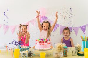 little-cute-girls-having-fun-while-celebrating-birthday-party